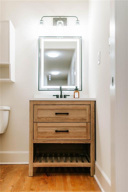7820 Bethel Road Gainesville, GA 30506 - Photo 31 of 56 a bathroom with a sink and a mirror