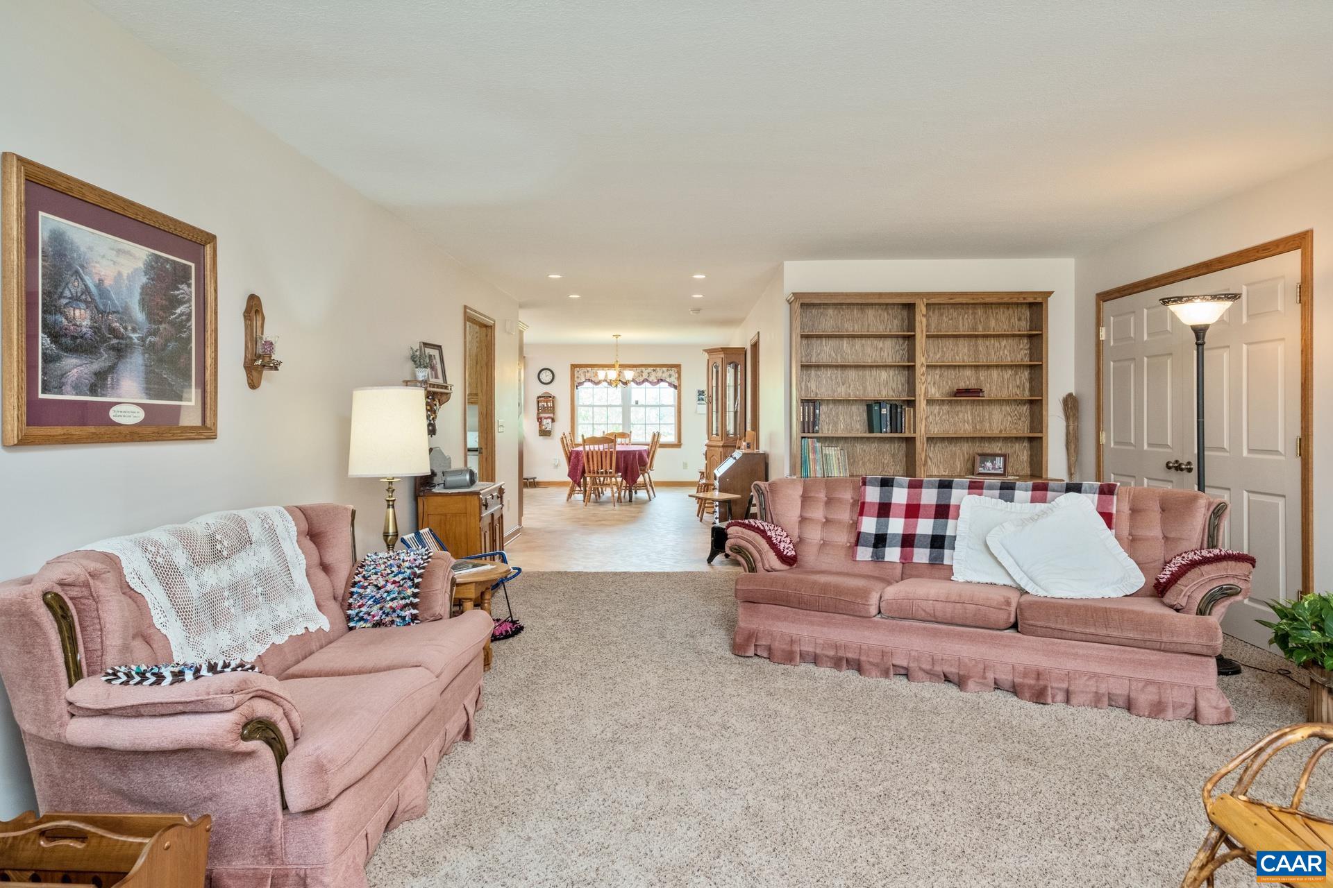 1640 Pea Ridge Road Stanardsville, VA 22973 - Photo 12 of 51 a living room with furniture and a large window