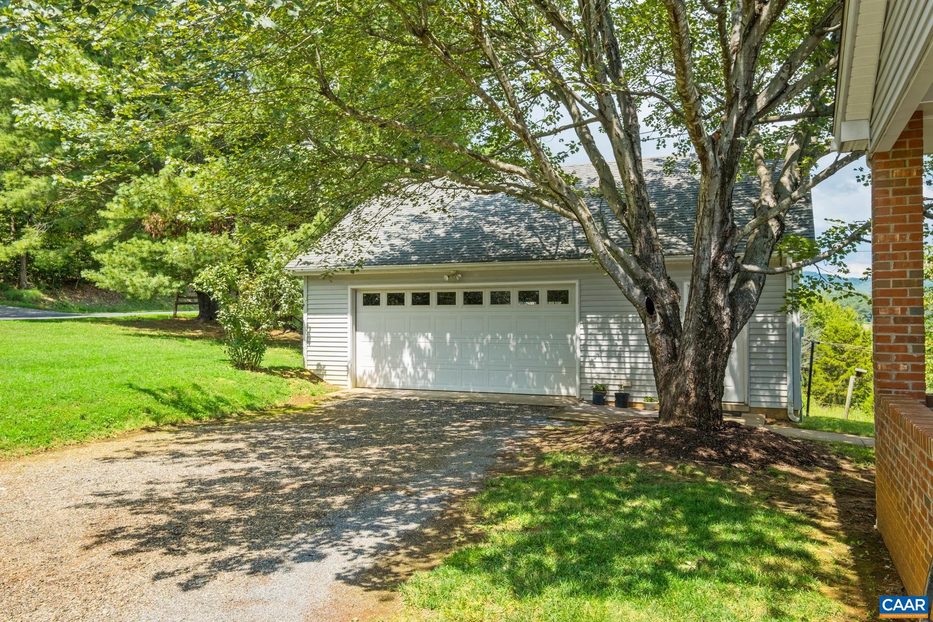 1640 Pea Ridge Road Stanardsville, VA 22973 - Photo 38 of 51 a view of a house with backyard and garden