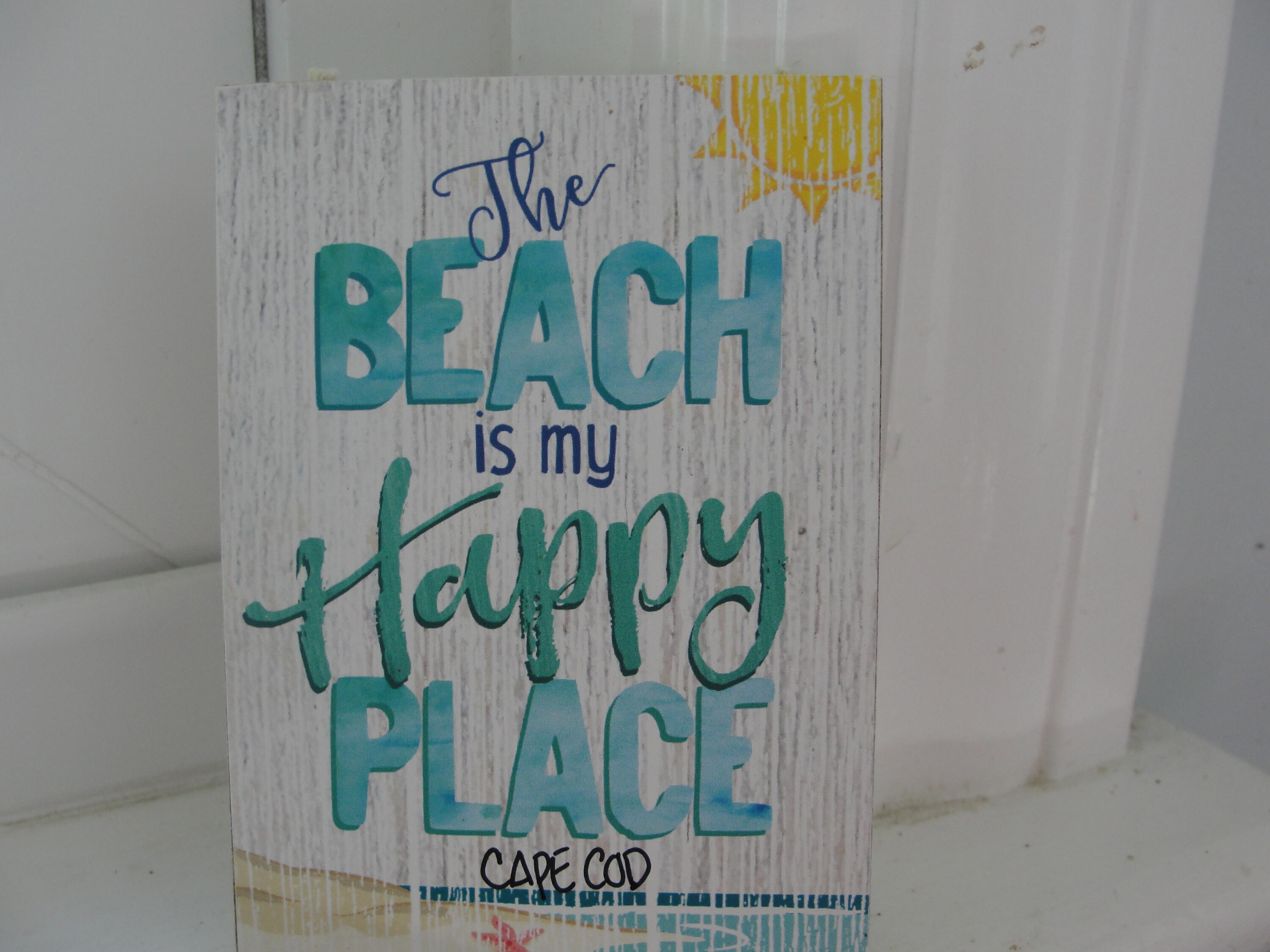 7 E Toms Path Dennis Port, MA 02639 - Photo 16 of 26 a close up of a sign