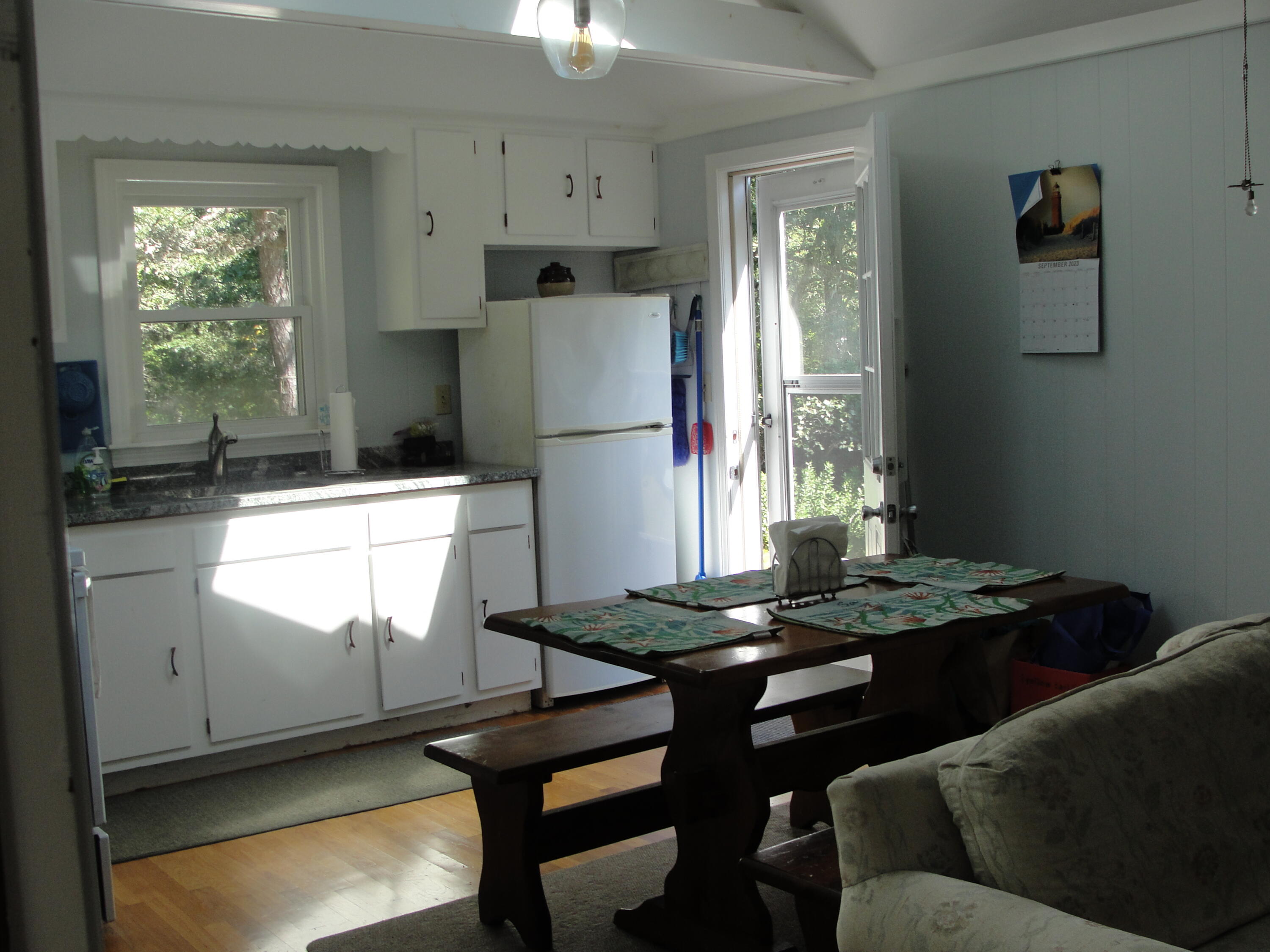 7 E Toms Path Dennis Port, MA 02639 - Photo 7 of 26 a room with furniture and window