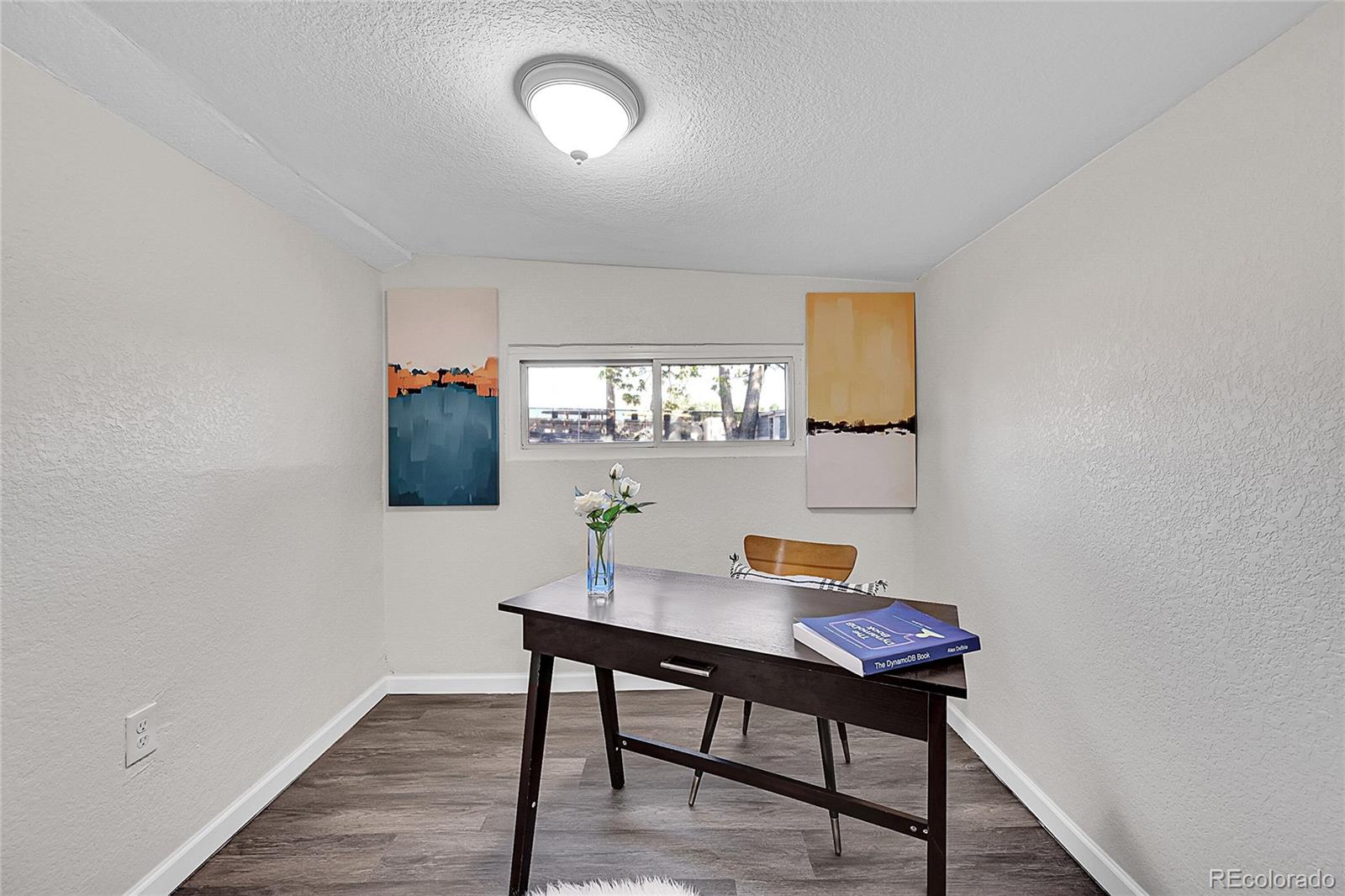 3984 Cook Street Denver, CO 80205 - Photo 19 of 29 a workspace with furniture and window