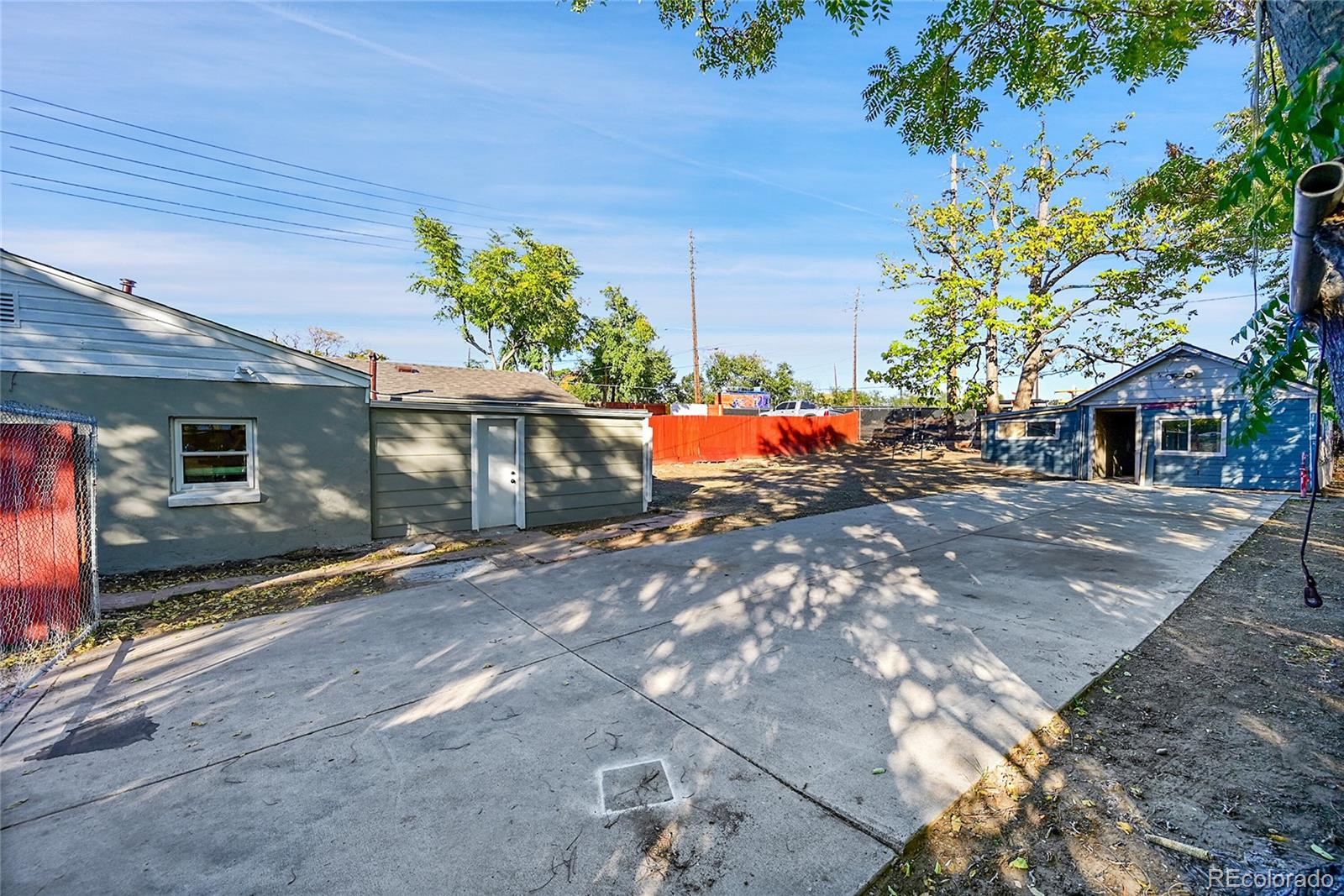 3984 Cook Street Denver, CO 80205 - Photo 20 of 29 a view of a house with a patio