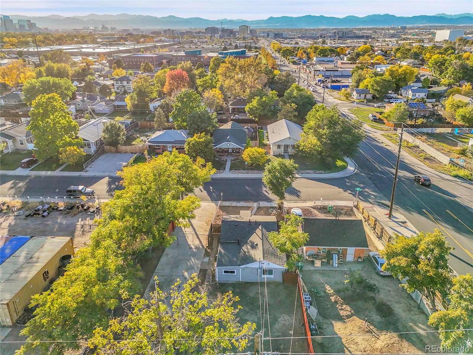 3984 Cook Street Denver, CO 80205 - Photo 2 of 29 an aerial view of residential houses with outdoor space