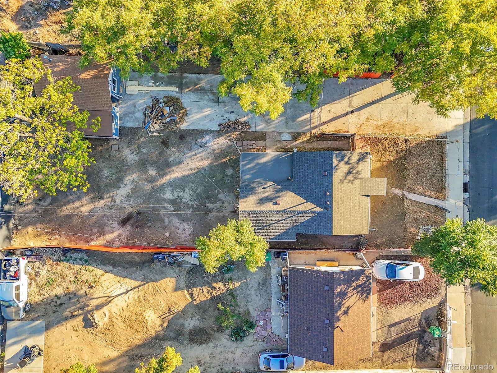 3984 Cook Street Denver, CO 80205 - Photo 24 of 29 a view of a house with a garden