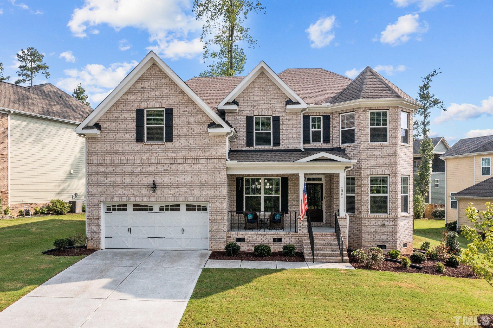 2351 Terrmini Drive Apex, NC 27502 - Photo 1 of 30 front view of a house with a yard