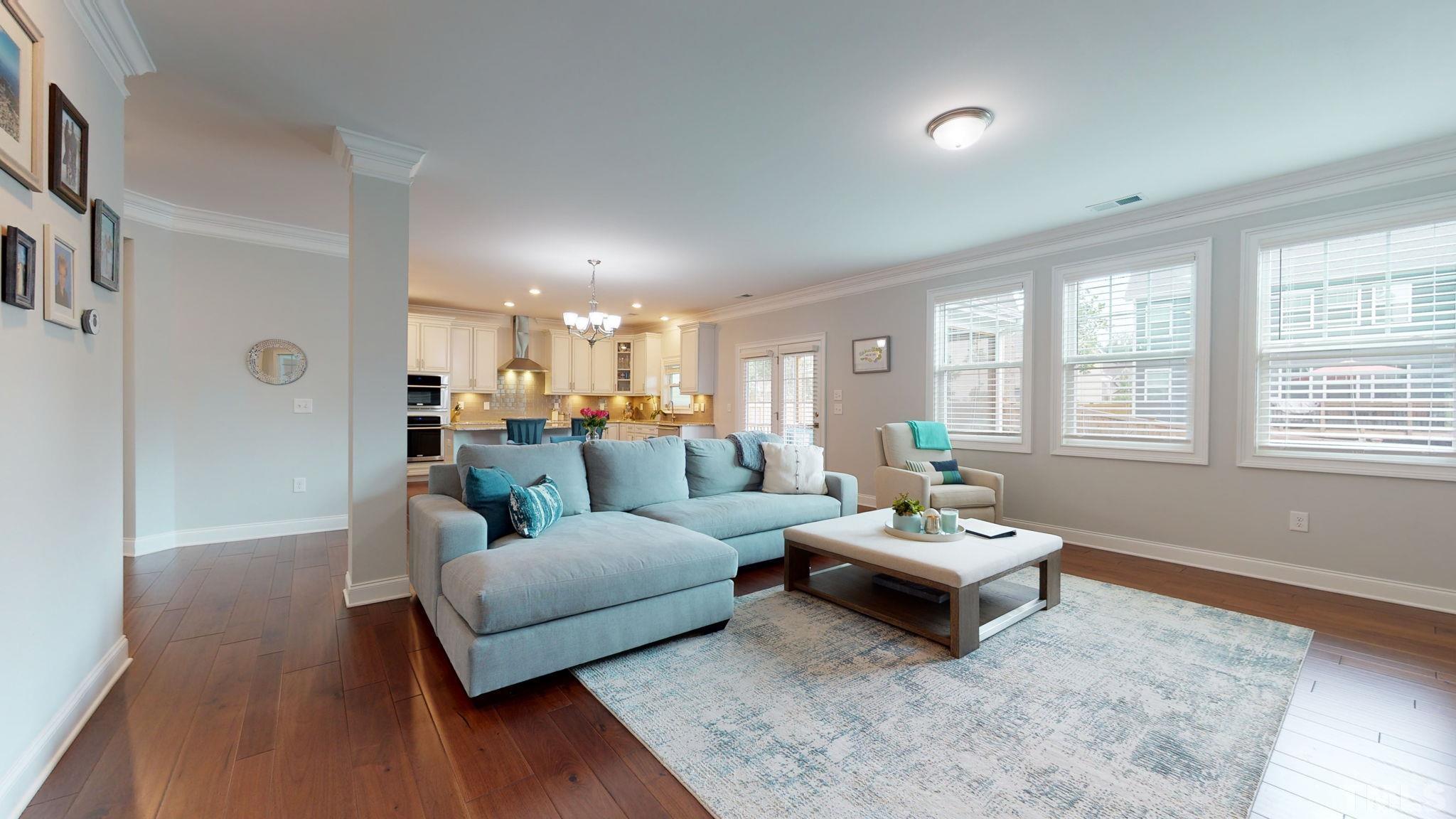 2351 Terrmini Drive Apex, NC 27502 - Photo 12 of 30 a living room with furniture and a large window