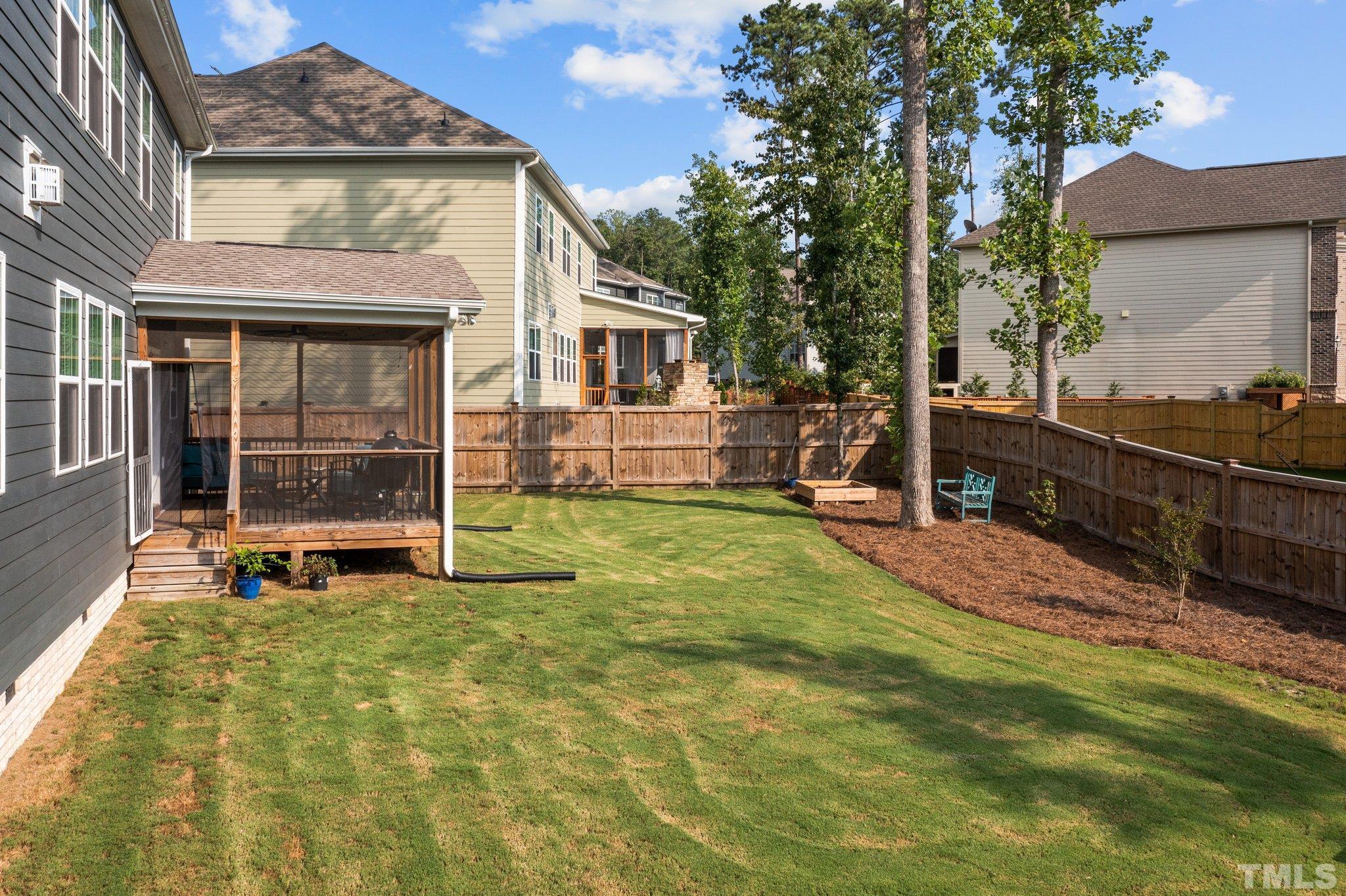 2351 Terrmini Drive Apex, NC 27502 - Photo 27 of 30 a view of a house with backyard and sitting area