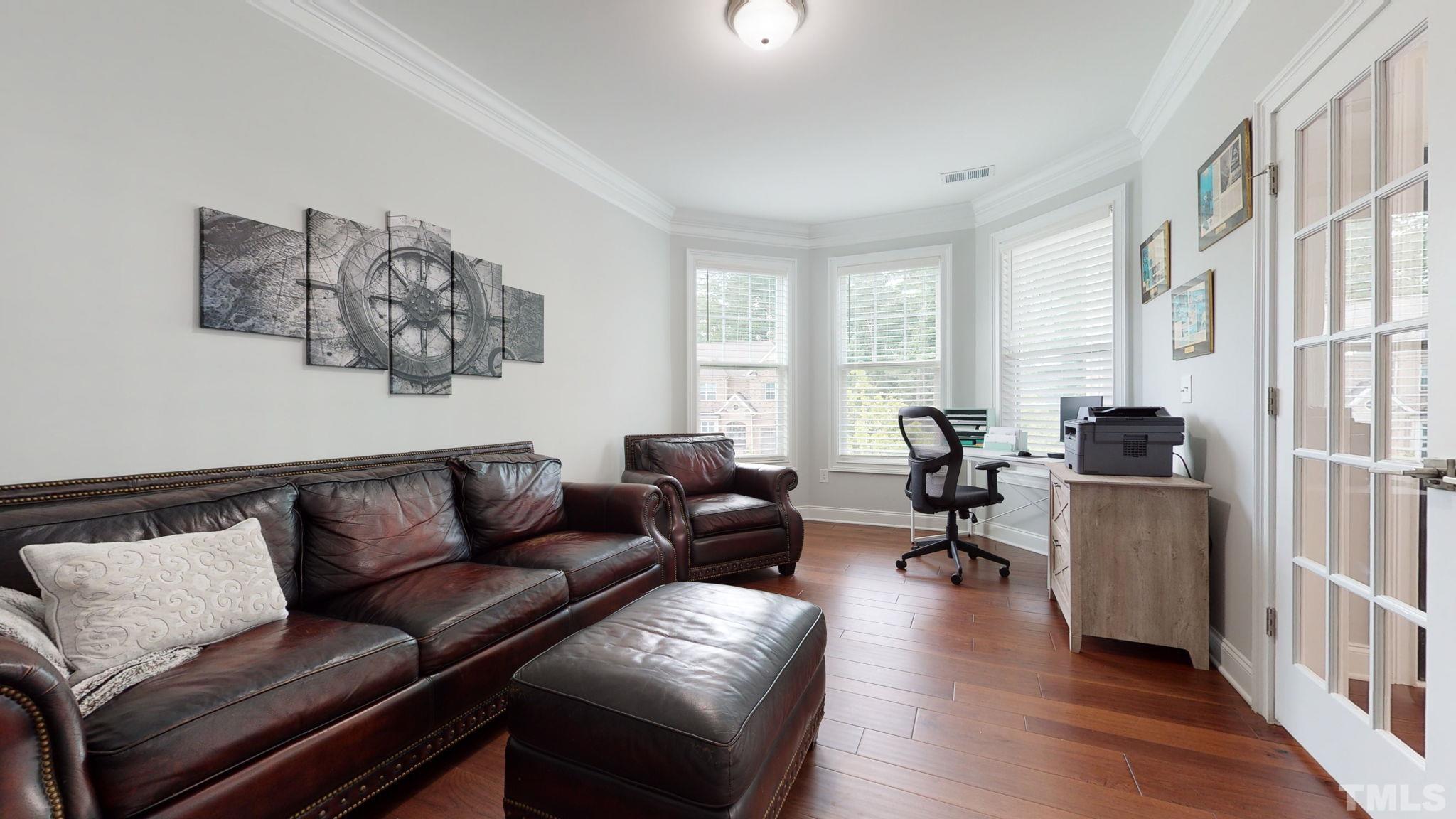 2351 Terrmini Drive Apex, NC 27502 - Photo 4 of 30 a living room with furniture or couch and a window
