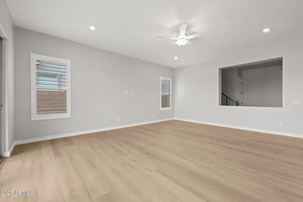 a bathroom with a double vanity sink and mirror