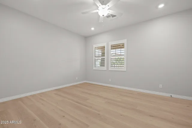 a view of a house with a snow in the background