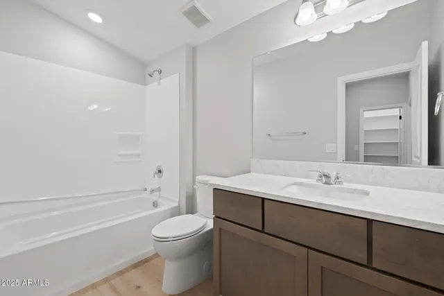 a view of a golf course with a lake