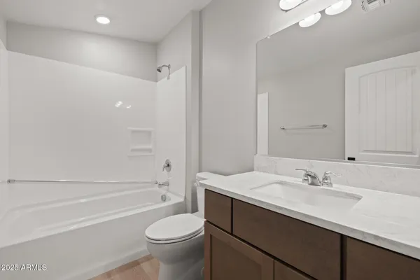 an aerial view of a house with a garden