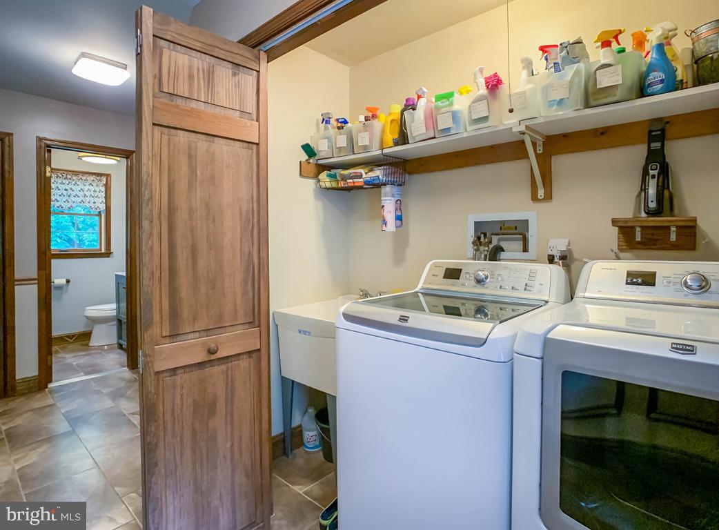 228 Rices Mill Road Wyncote, PA 19095 - Photo 25 of 64 Laundry area with utility sink