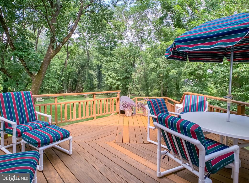 228 Rices Mill Road Wyncote, PA 19095 - Photo 56 of 64 Multi-level deck overlooks expansive back yard