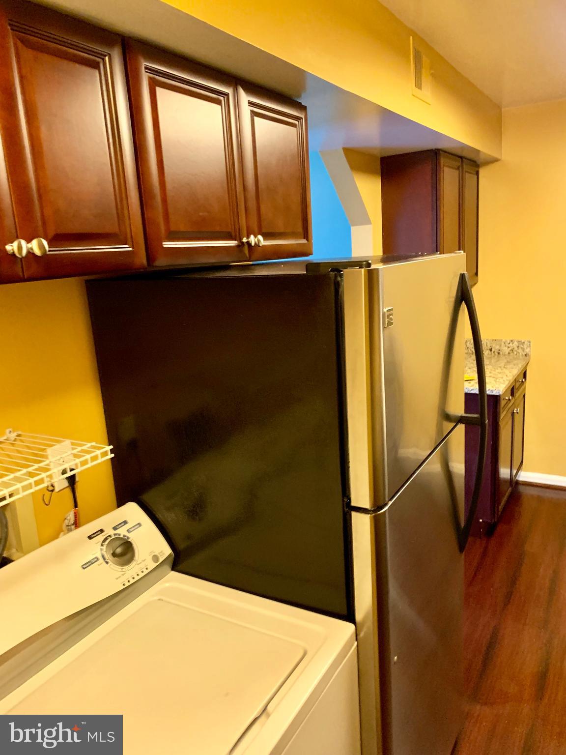 9025 North Laurel Road, Unit I Laurel, MD 20723 - Photo 17 of 38 Washer and Dryer | Kitchen