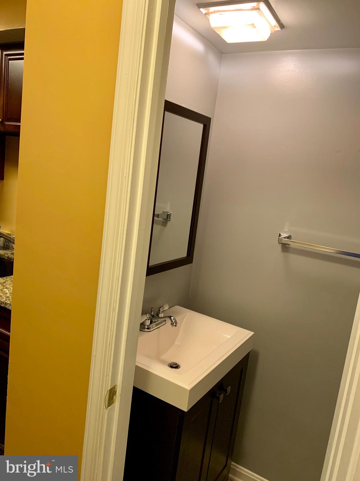 9025 North Laurel Road, Unit I Laurel, MD 20723 - Photo 20 of 38 Powder Room