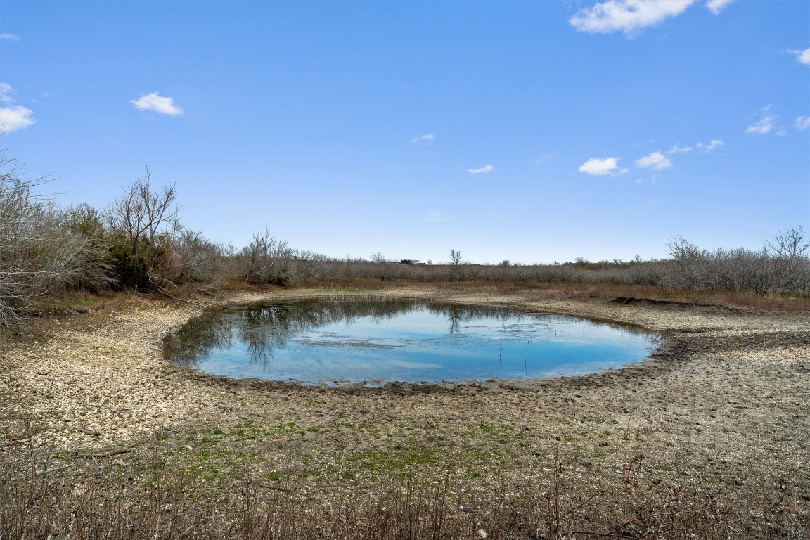 0 Rolling Ridge Road Lockhart, TX 78644 - Photo 28 of 34 a view of a lake with outdoor space
