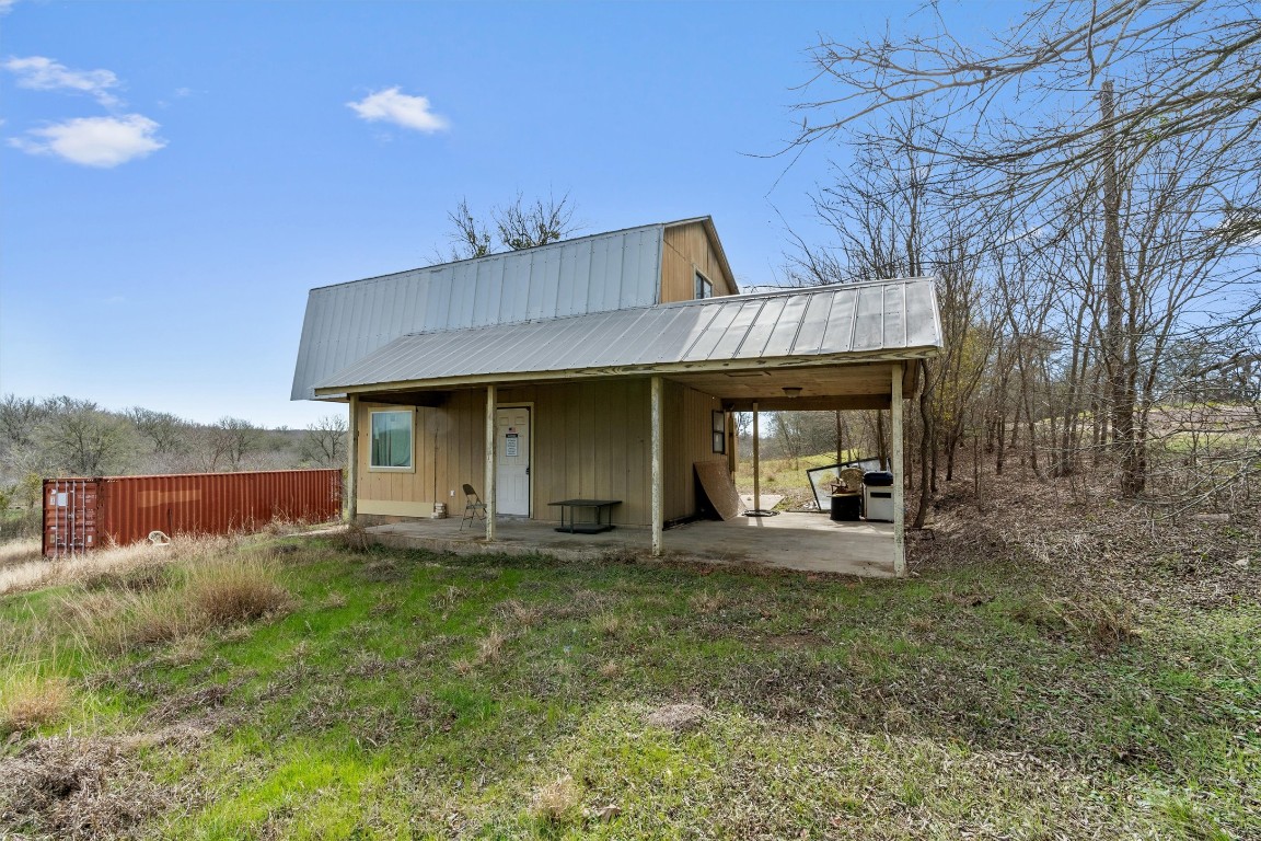 0 Rolling Ridge Road Lockhart, TX 78644 - Photo 30 of 34 a front view of a house with garden