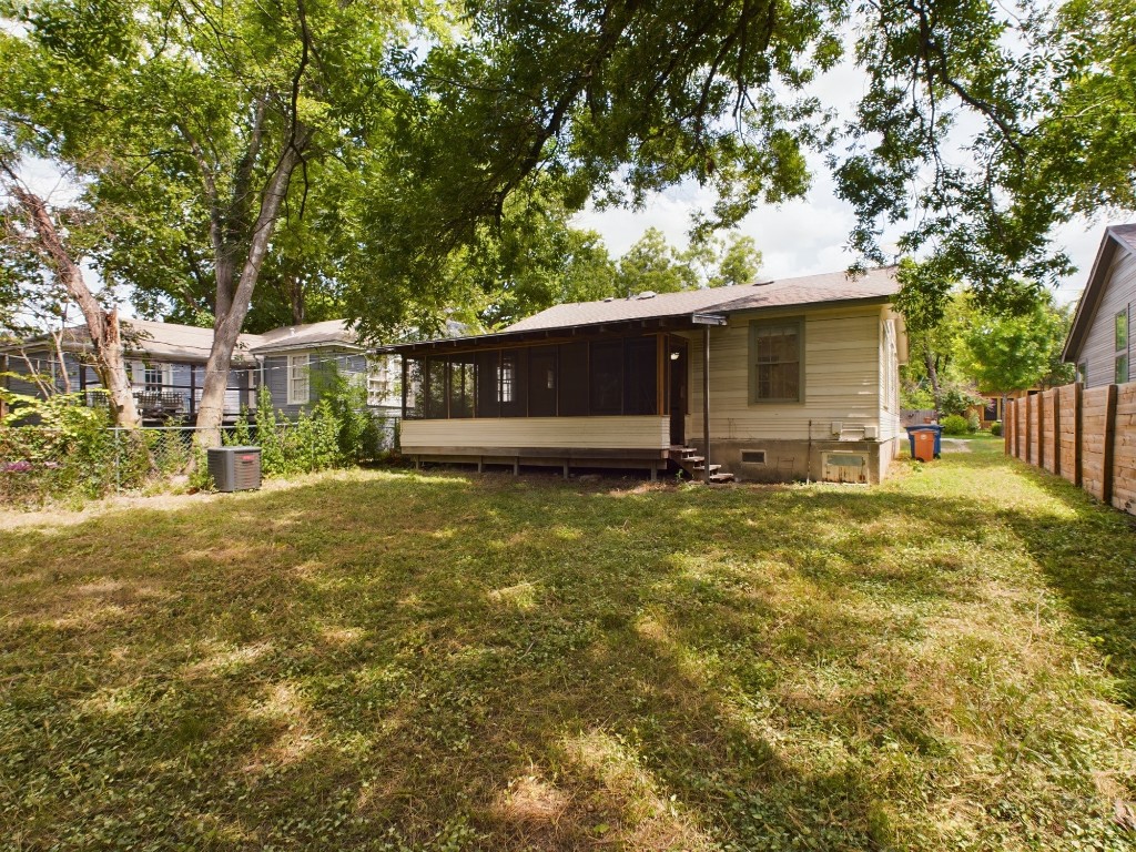 713 Harris Avenue Austin, TX 78705 - Photo 6 of 12 a view of a house with a yard