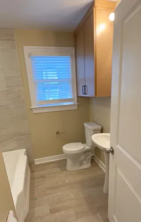 a bathroom with a toilet