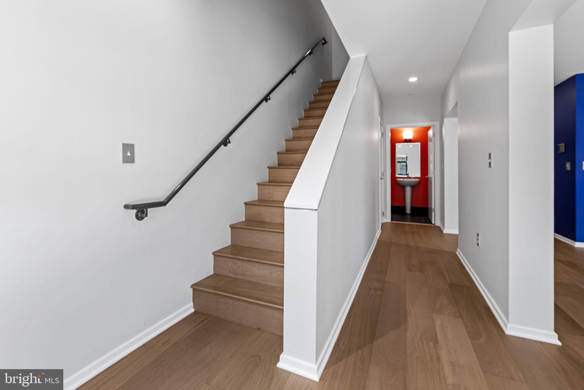 1200 Steuart Street, Unit 1035 Baltimore, MD 21230 - Photo 29 of 96 a view of entryway and hall with wooden floor