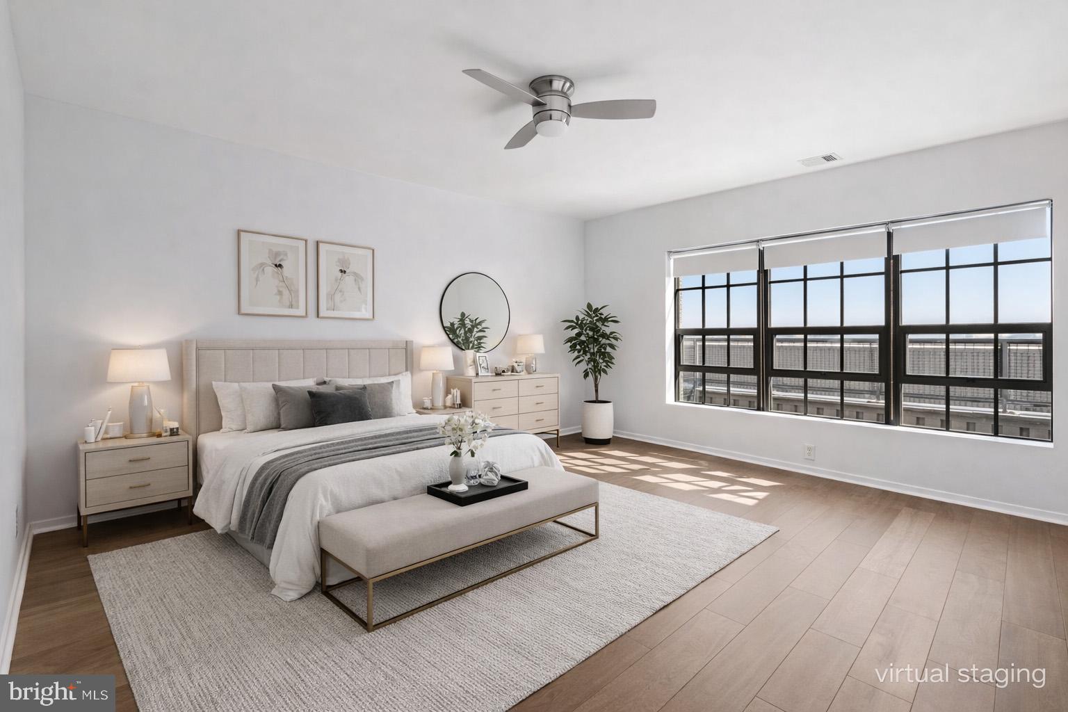 1200 Steuart Street, Unit 1035 Baltimore, MD 21230 - Photo 50 of 96 a living room with furniture and a large window