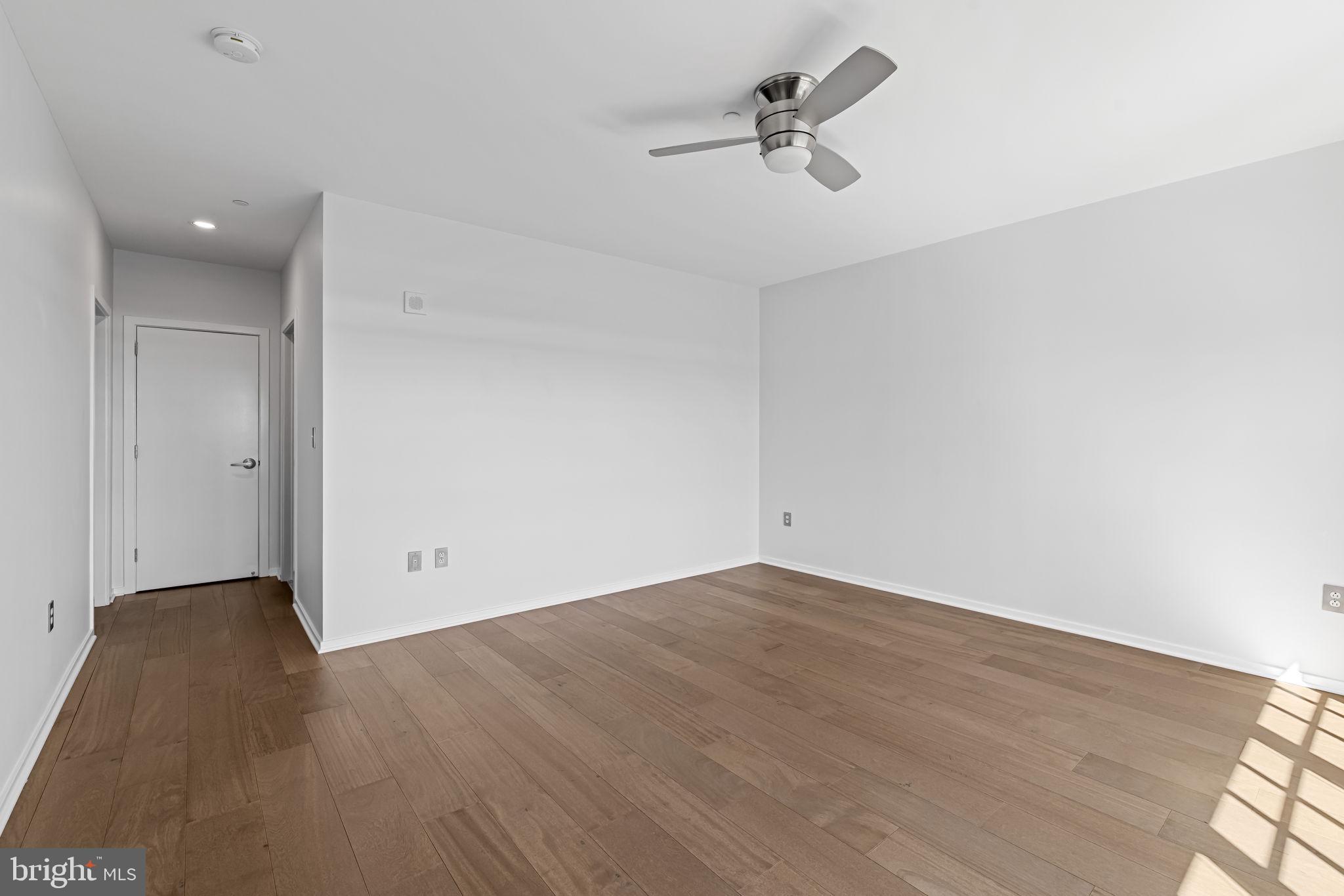 1200 Steuart Street, Unit 1035 Baltimore, MD 21230 - Photo 53 of 96 wooden floor in an empty room