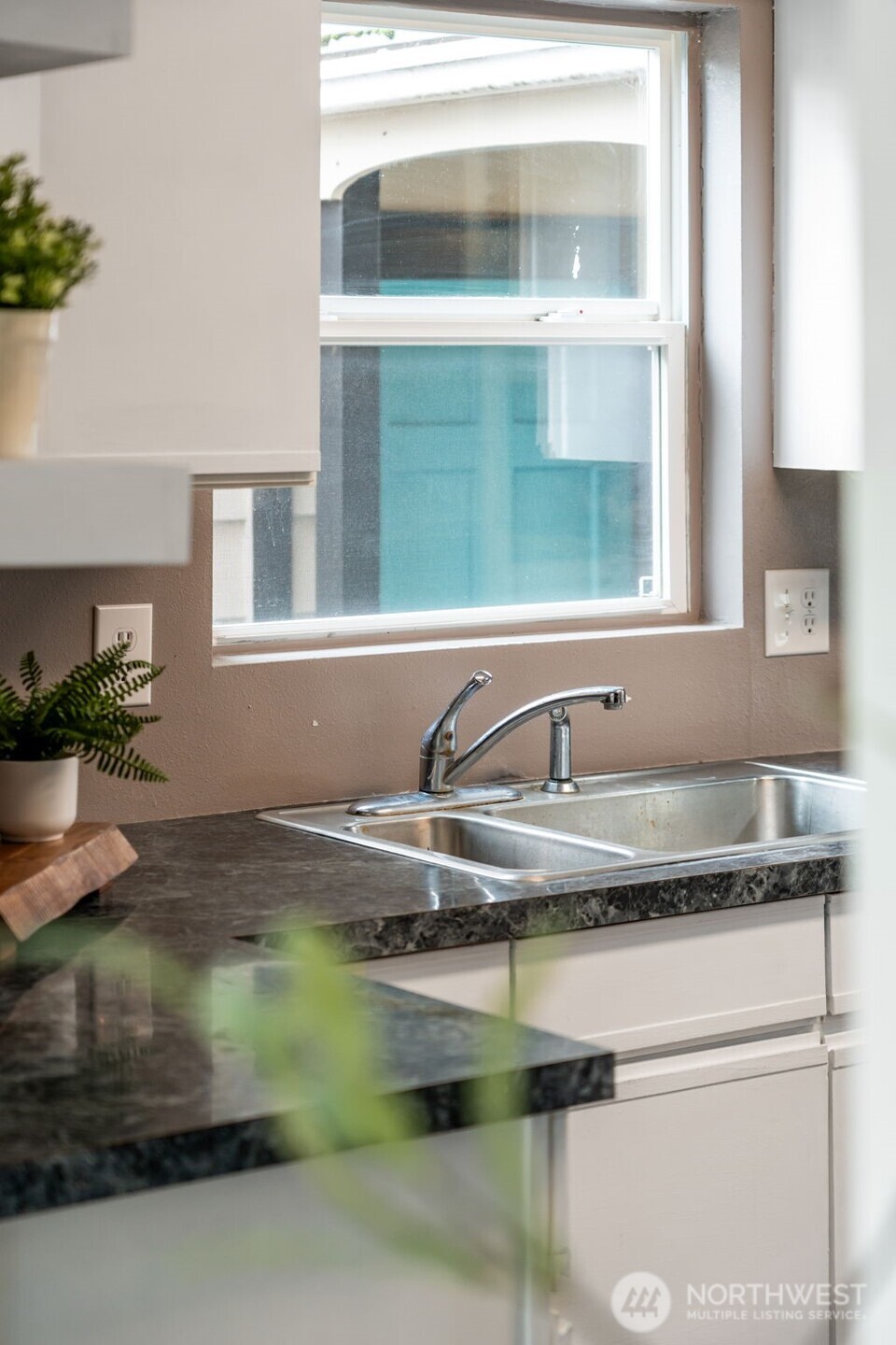 2403 34th Avenue Longview, WA 98632 - Photo 12 of 40 a close view of sink and tap