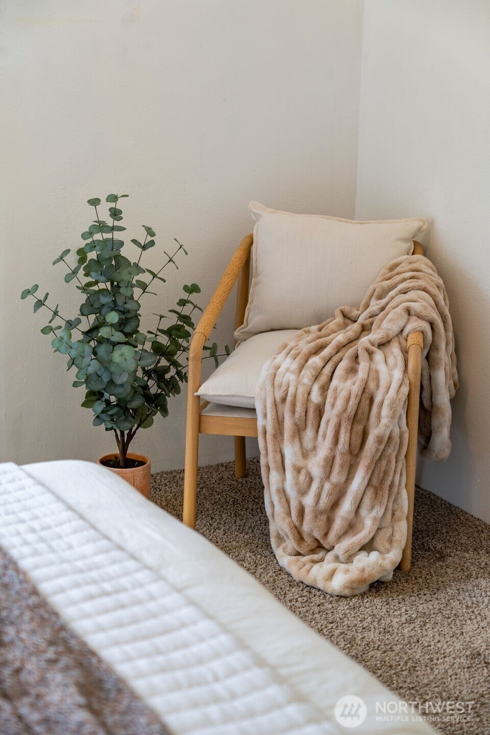 2403 34th Avenue Longview, WA 98632 - Photo 20 of 40 a bedroom with a bed and a potted plant