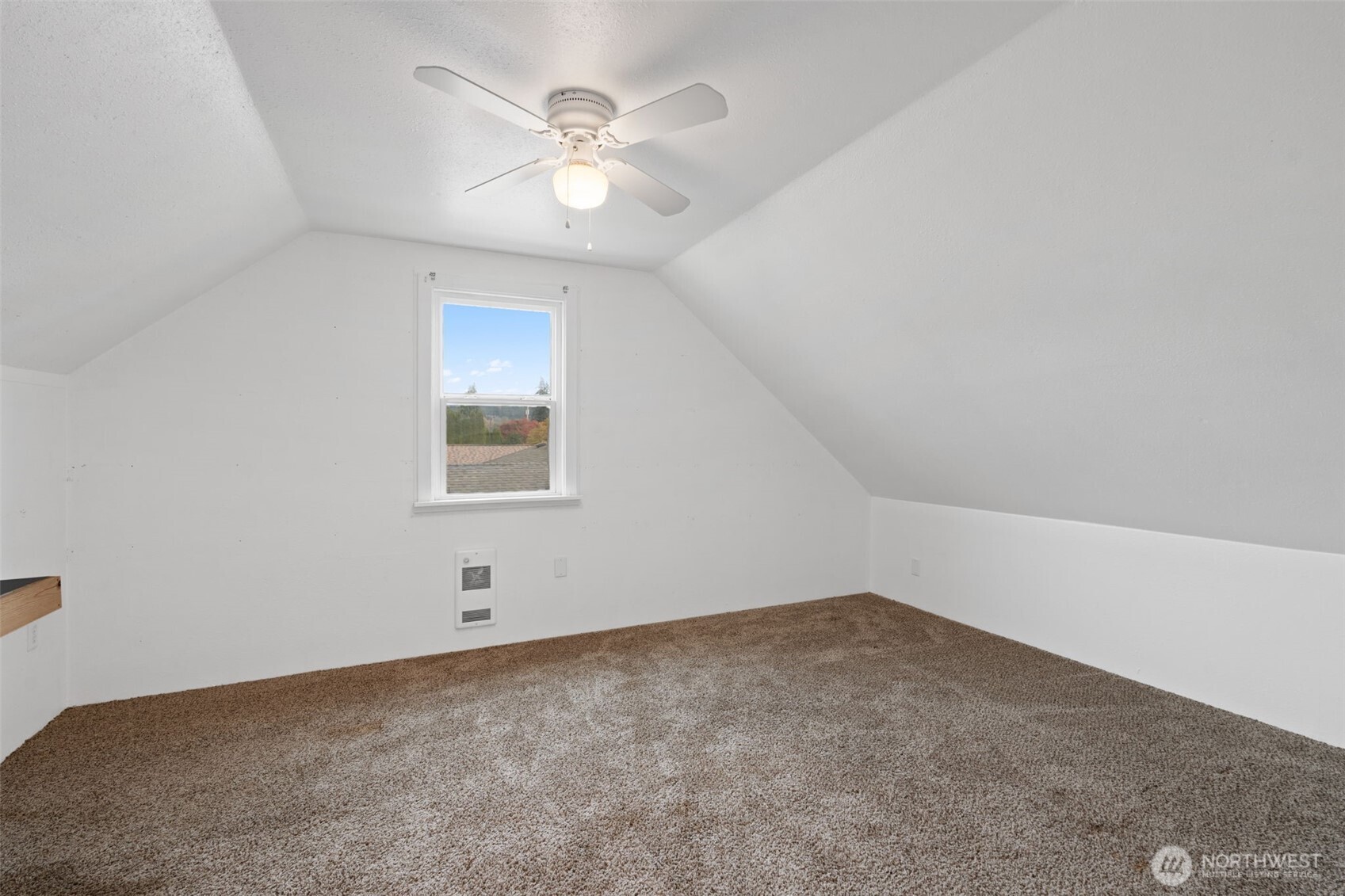 2403 34th Avenue Longview, WA 98632 - Photo 26 of 40 an empty room with a chandelier fan