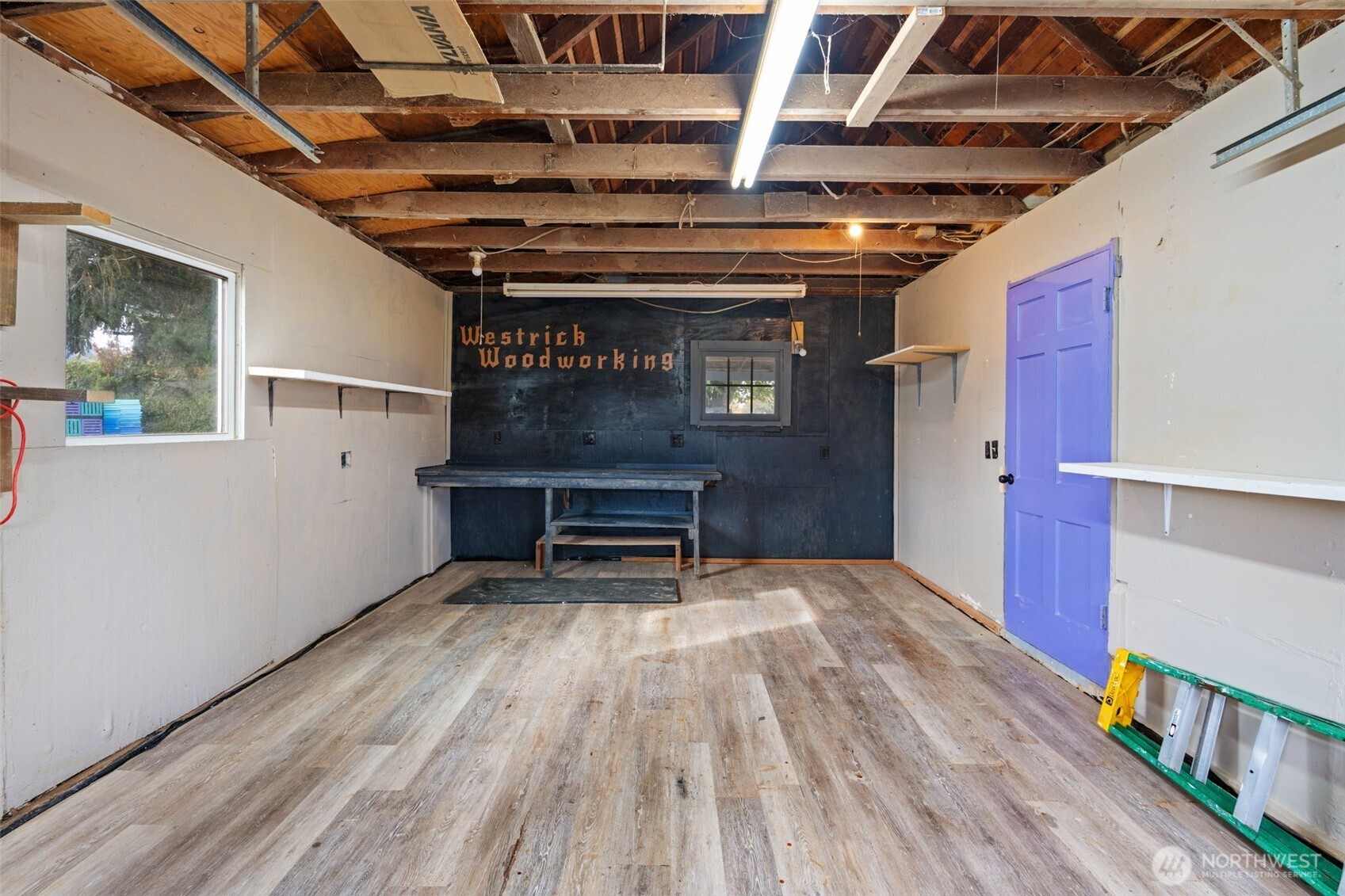 2403 34th Avenue Longview, WA 98632 - Photo 29 of 40 a view of an empty room with wooden floor
