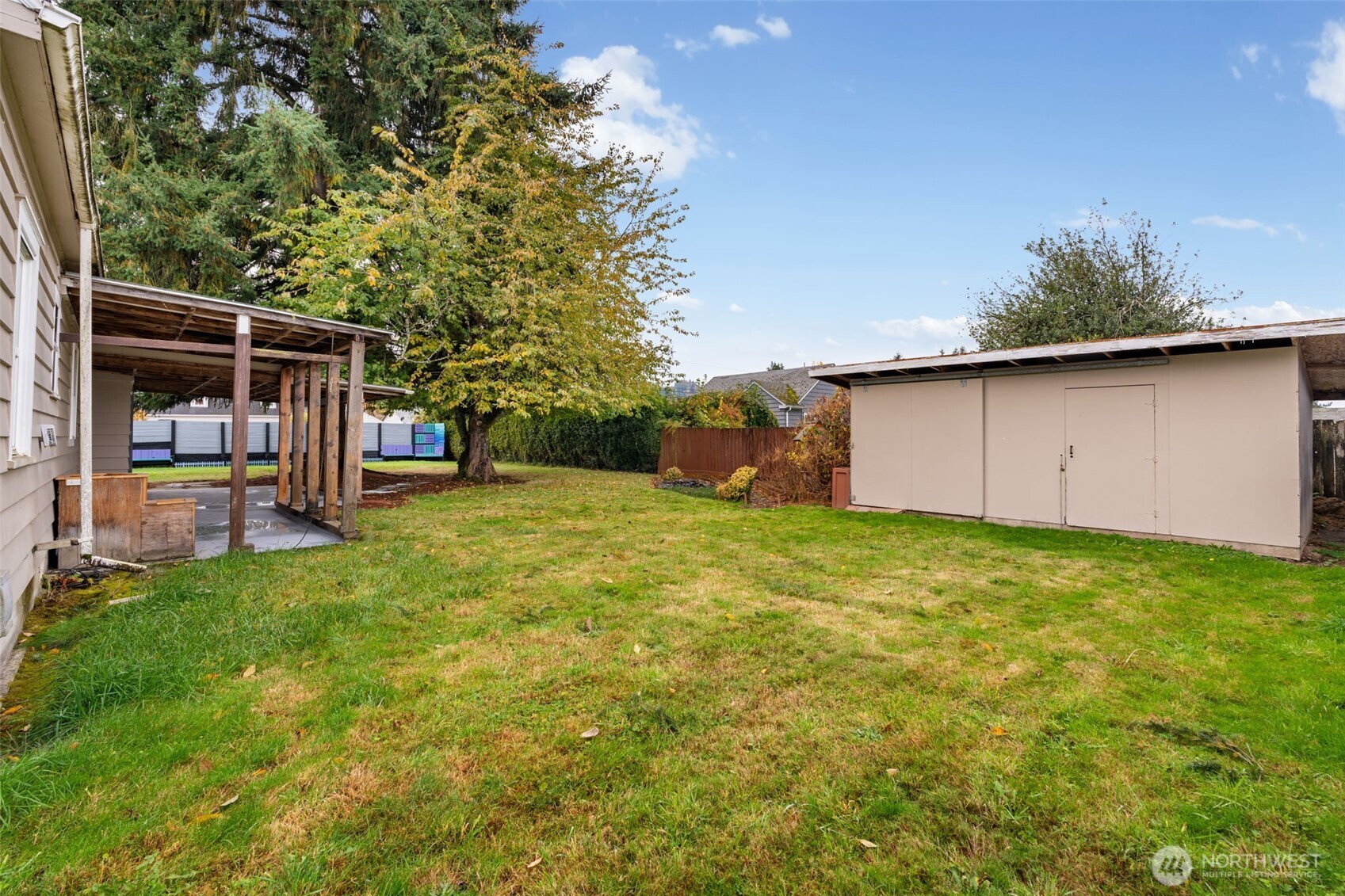 2403 34th Avenue Longview, WA 98632 - Photo 31 of 40 a backyard of a house with lots of green space