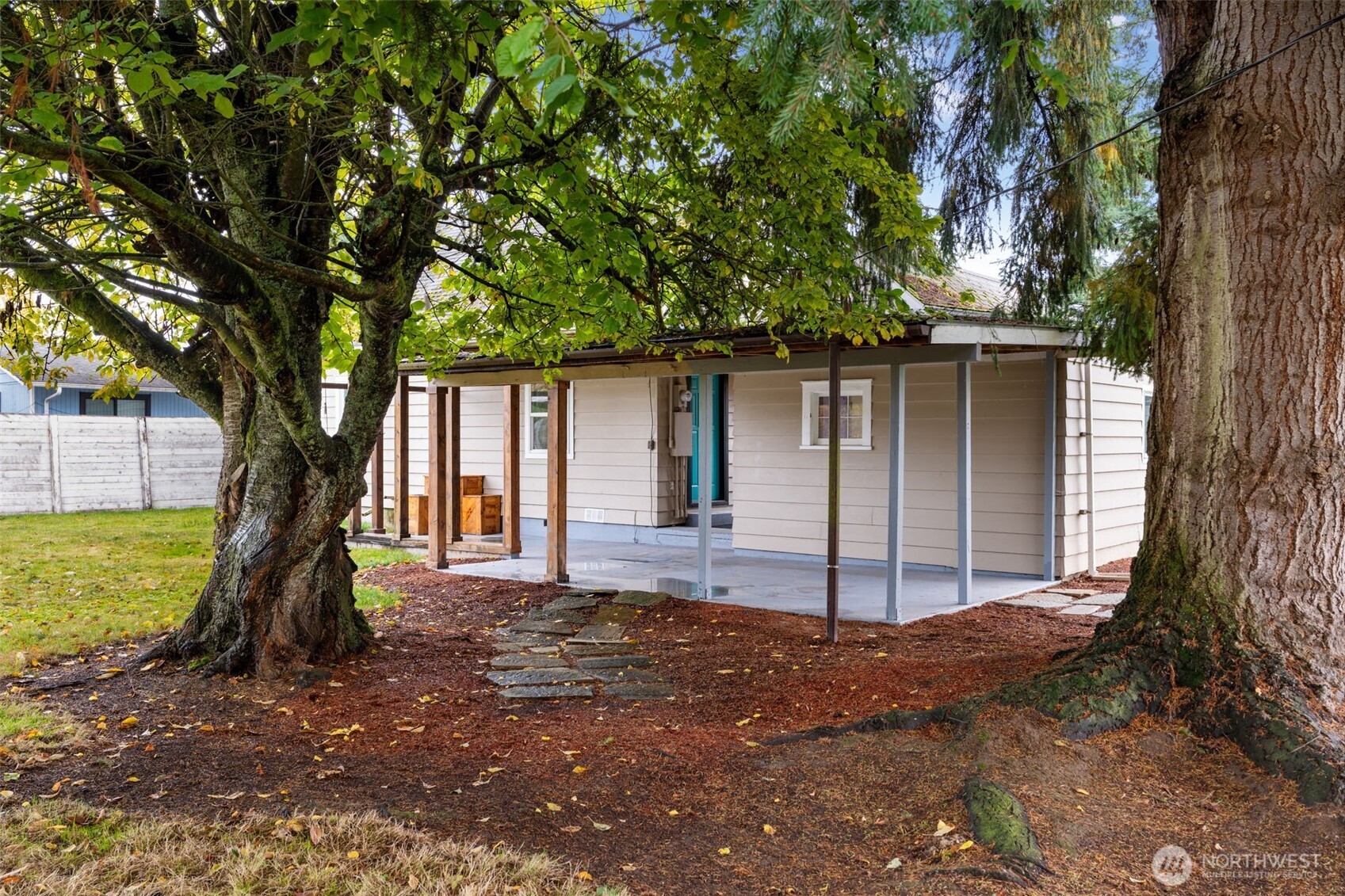 2403 34th Avenue Longview, WA 98632 - Photo 32 of 40 a front view of a house with a yard and garage