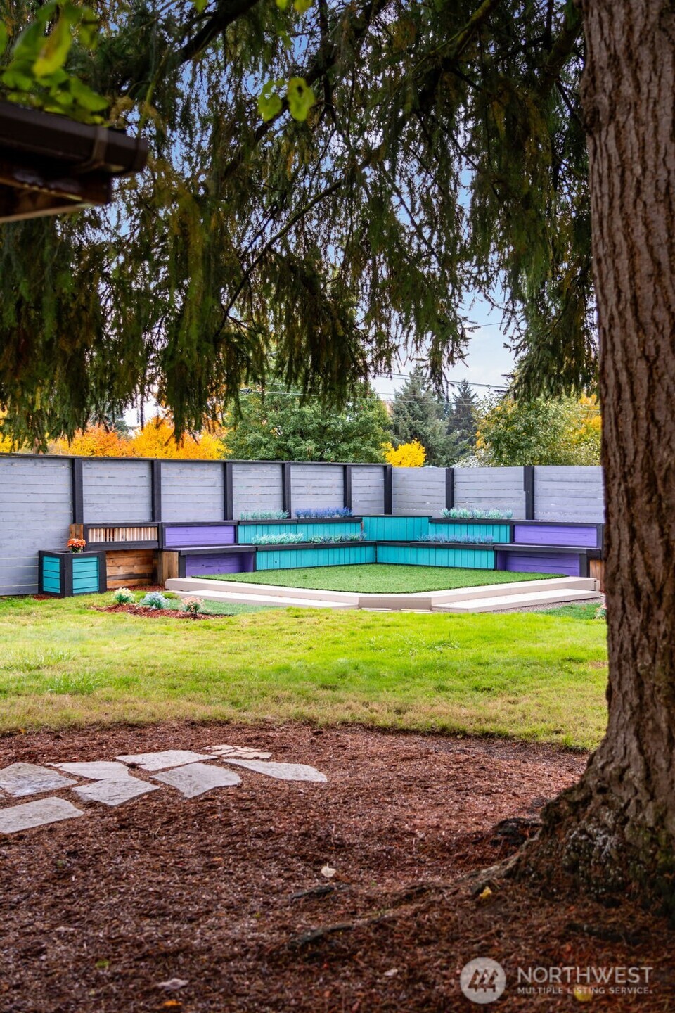 2403 34th Avenue Longview, WA 98632 - Photo 36 of 40 a swimming pool with outdoor seating and yard