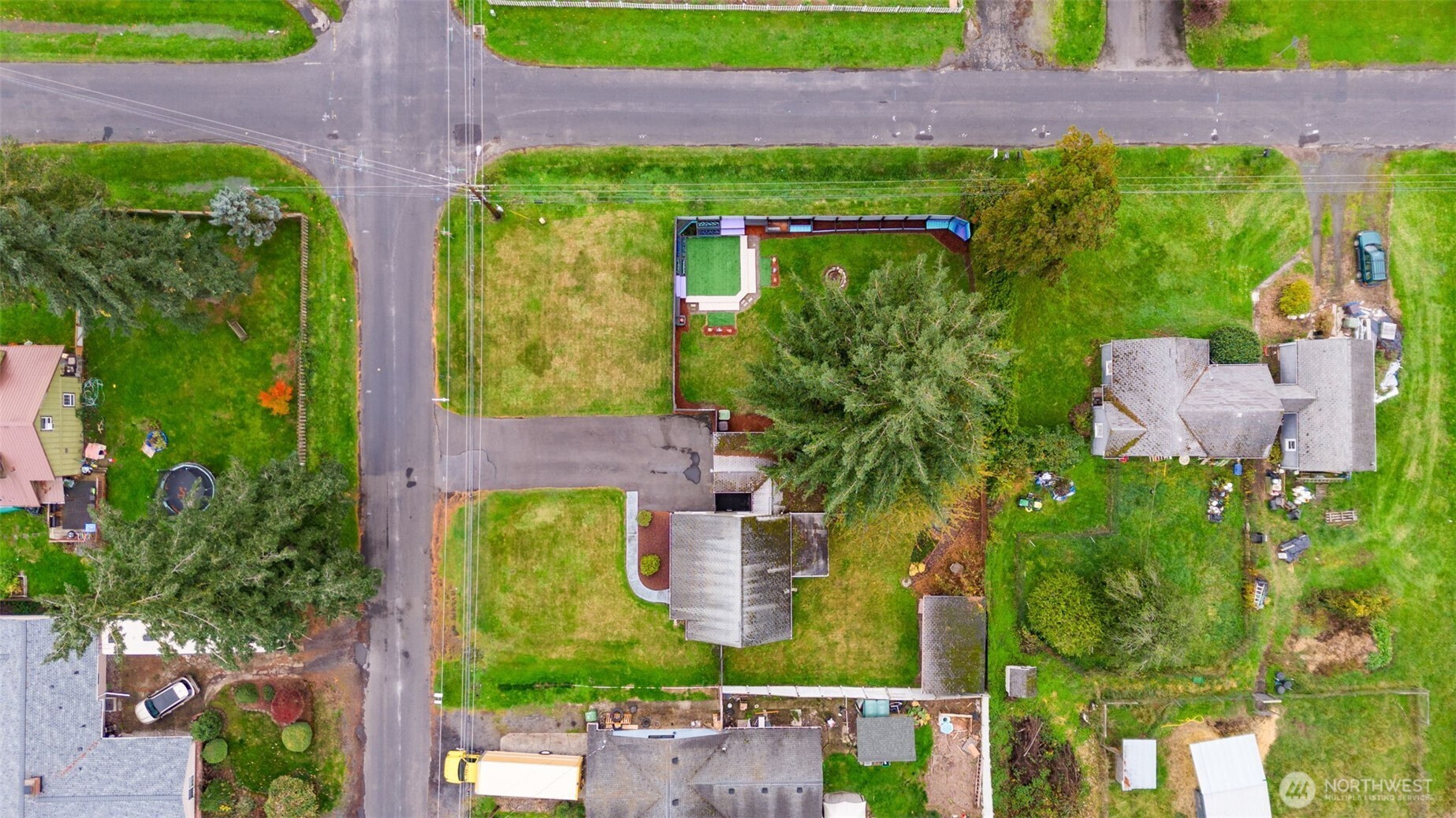 2403 34th Avenue Longview, WA 98632 - Photo 38 of 40 a aerial view of a house with garden space and street view