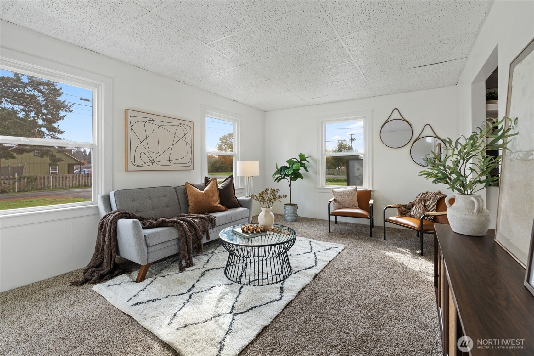 2403 34th Avenue Longview, WA 98632 - Photo 6 of 40 a living room with furniture potted plant and window