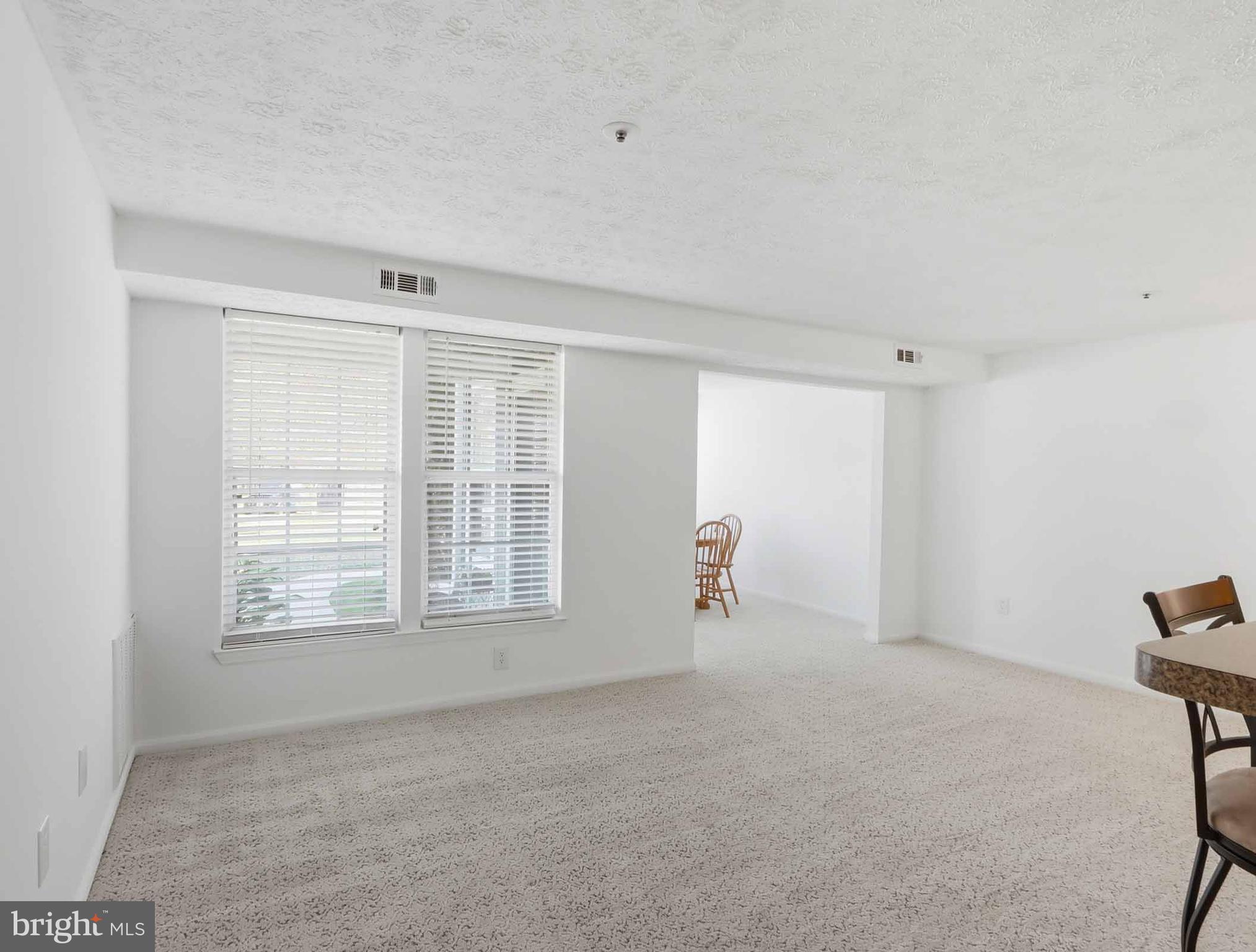 697 Deering Road, Unit 5A Pasadena, MD 21122 - Photo 15 of 24 a view of an empty room with a window