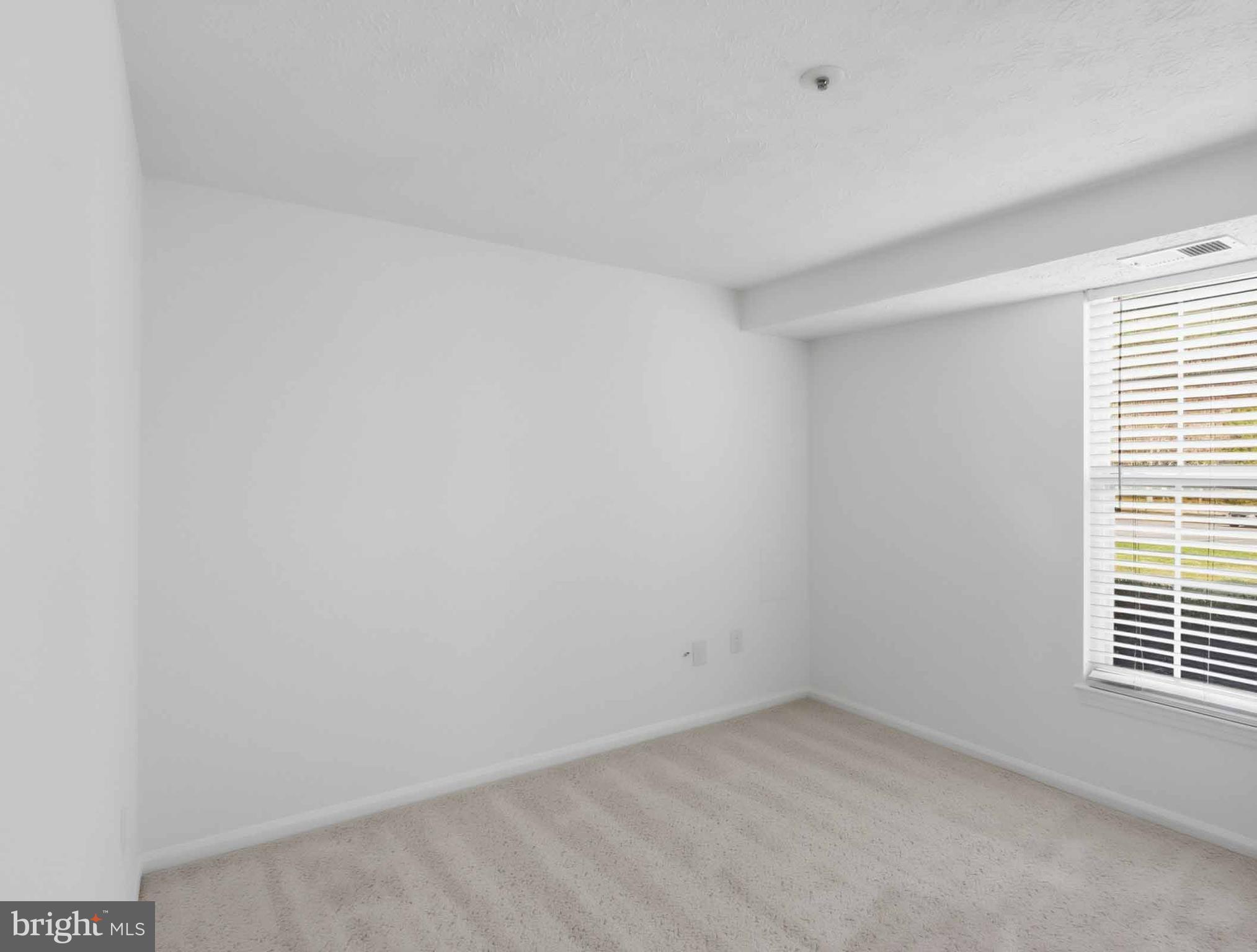 697 Deering Road, Unit 5A Pasadena, MD 21122 - Photo 17 of 24 a view of a room that has a window in it