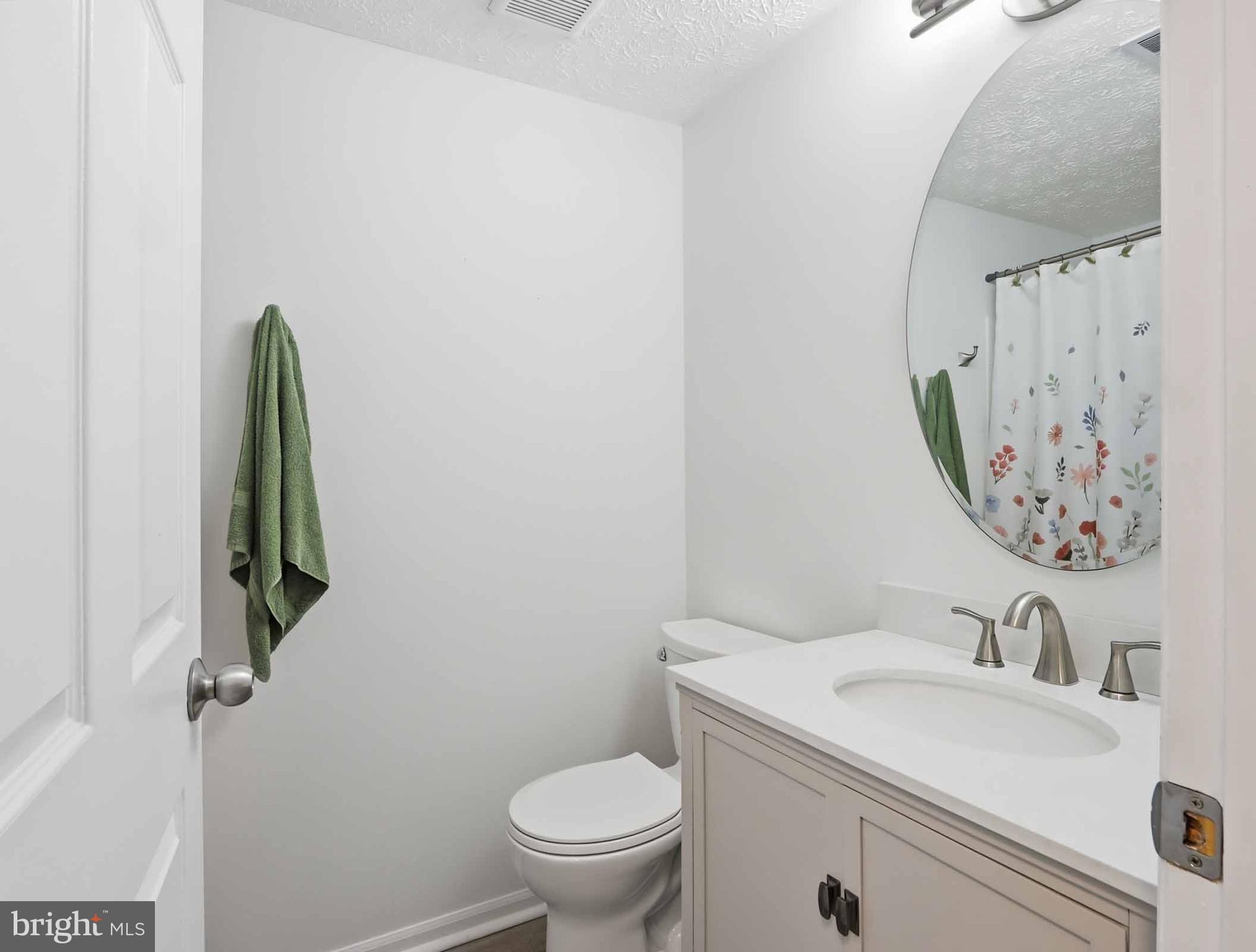 697 Deering Road, Unit 5A Pasadena, MD 21122 - Photo 18 of 24 a bathroom with a toilet and a sink