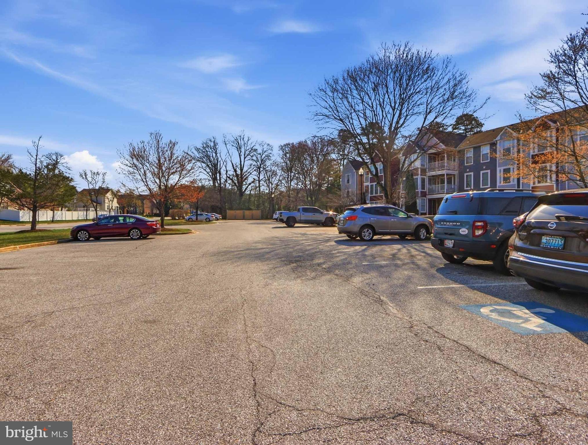 697 Deering Road, Unit 5A Pasadena, MD 21122 - Photo 5 of 24 a view of street with parked cars