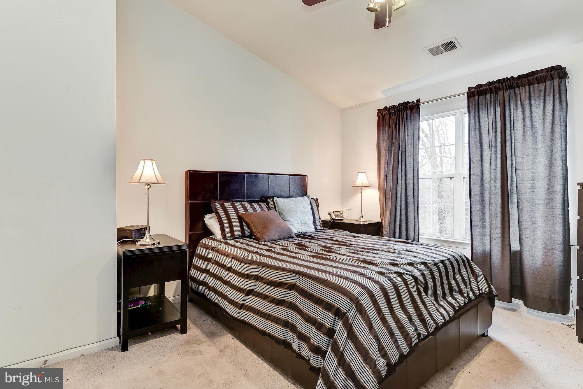 804 Alabaster Court Capitol Heights, MD 20743 - Photo 15 of 30 a bedroom with a bed and window