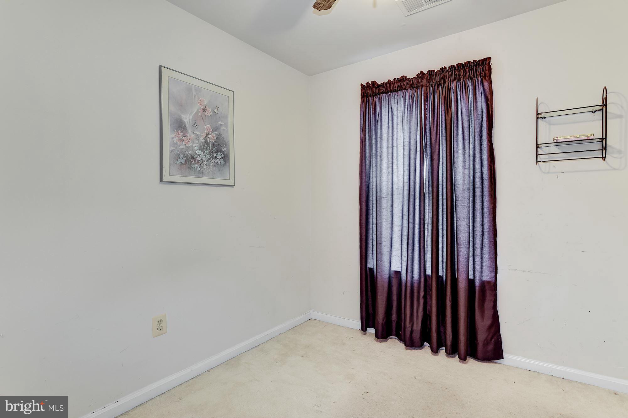 804 Alabaster Court Capitol Heights, MD 20743 - Photo 18 of 30 an entryway with a mirror