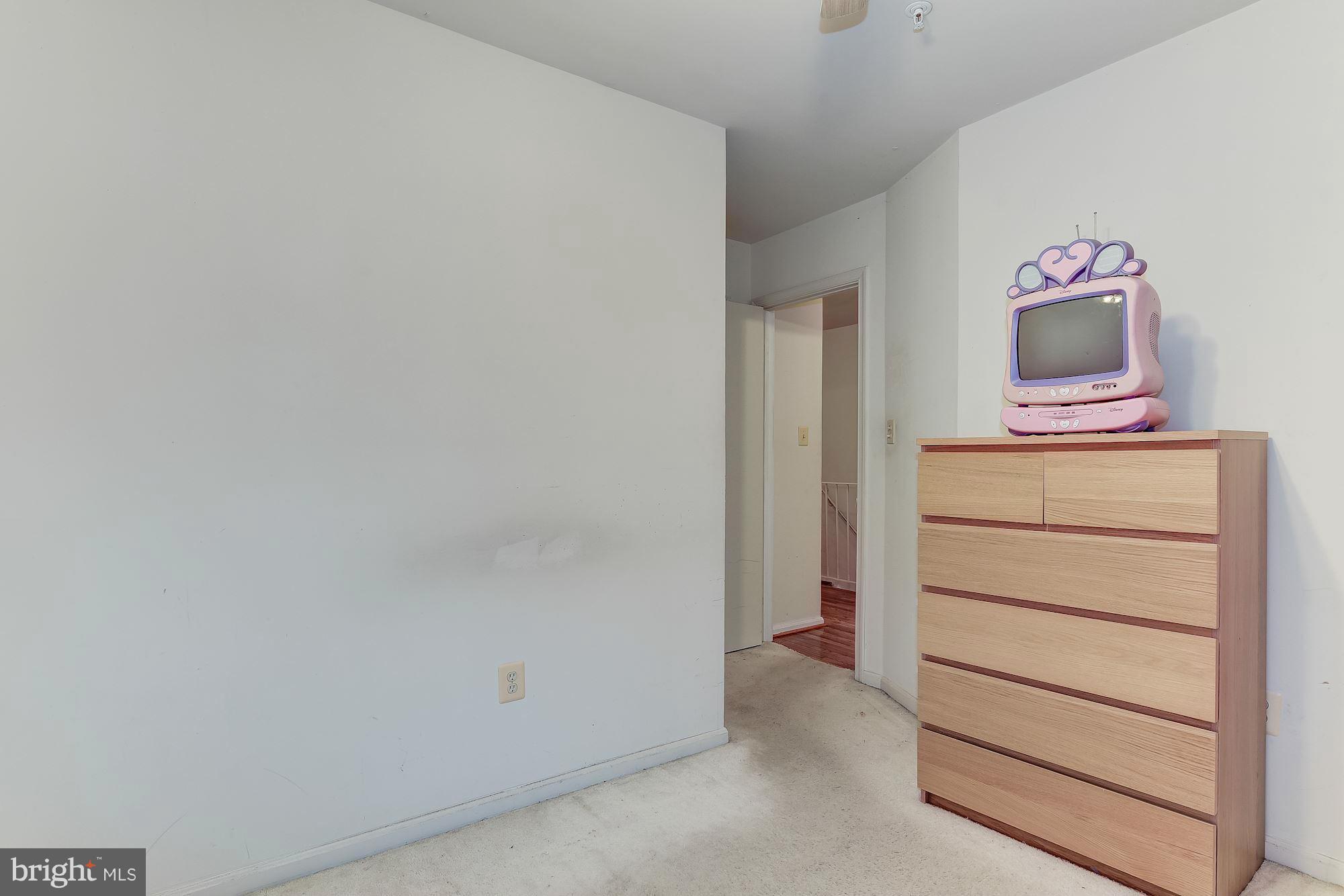 804 Alabaster Court Capitol Heights, MD 20743 - Photo 22 of 30 a room with a bench