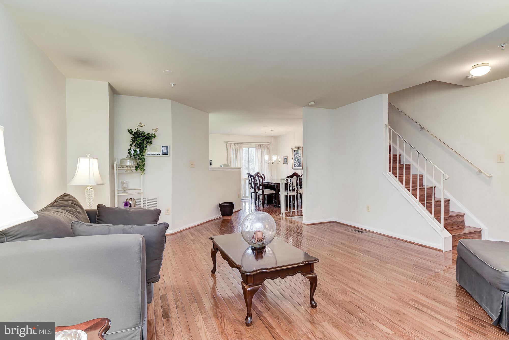 804 Alabaster Court Capitol Heights, MD 20743 - Photo 6 of 30 a living room with furniture and wooden floor