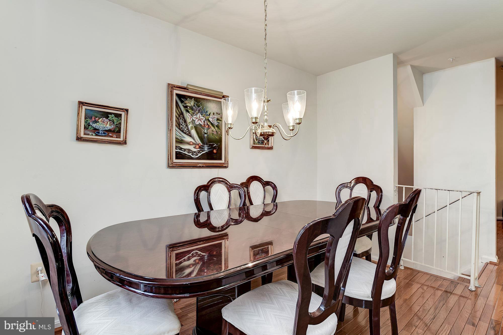 804 Alabaster Court Capitol Heights, MD 20743 - Photo 8 of 30 a table and chairs in a room