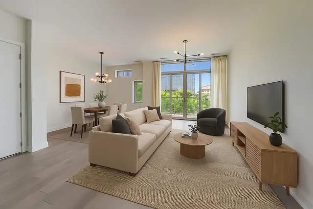 a spacious bedroom with a bed and a ceiling fan