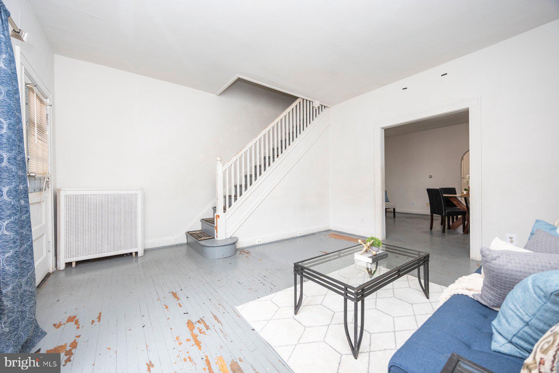 3237 Dudley Avenue Baltimore, MD 21213 - Photo 4 of 16 Living room w/ 9ft ceilings