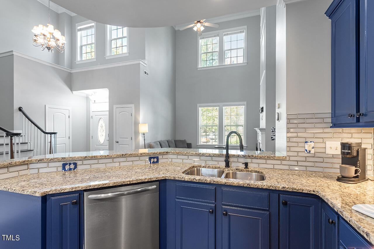 1337 Formal Garden Way Raleigh, NC 27603 - Photo 16 of 36 a bathroom with double sink and a mirror