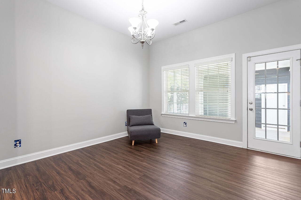 1337 Formal Garden Way Raleigh, NC 27603 - Photo 20 of 36 a living room with furniture and a window